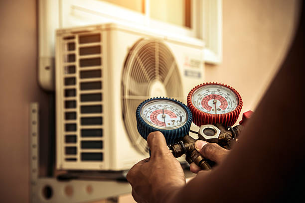 Professional Ductwork Repair technician working in Baldwin, NY